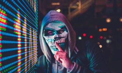 person standing near LED sign